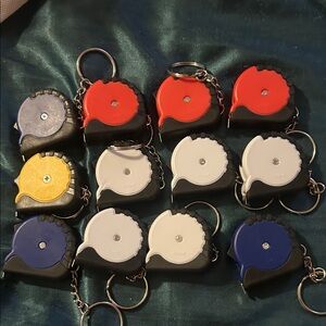 Assorted Tape Measure Keychains different colors. Perfect for a stocking stuffer